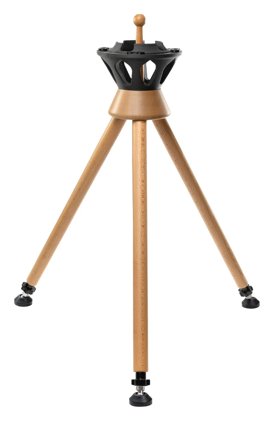 Le trépied Atlas All en bois clair sans ses rallonges, sur fond blanc : les trois jambes courtes vissées sous la tête noire, en position basse.